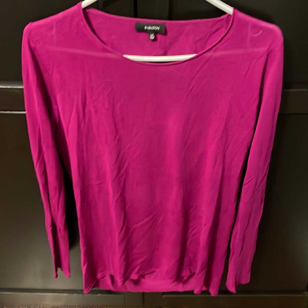 NWOT Babaton beautiful light weight sweater/top with cut out back. Sizexxs.